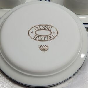 A Set of 3 Dansk Bistro Blue and White Coffee Cup Saucers